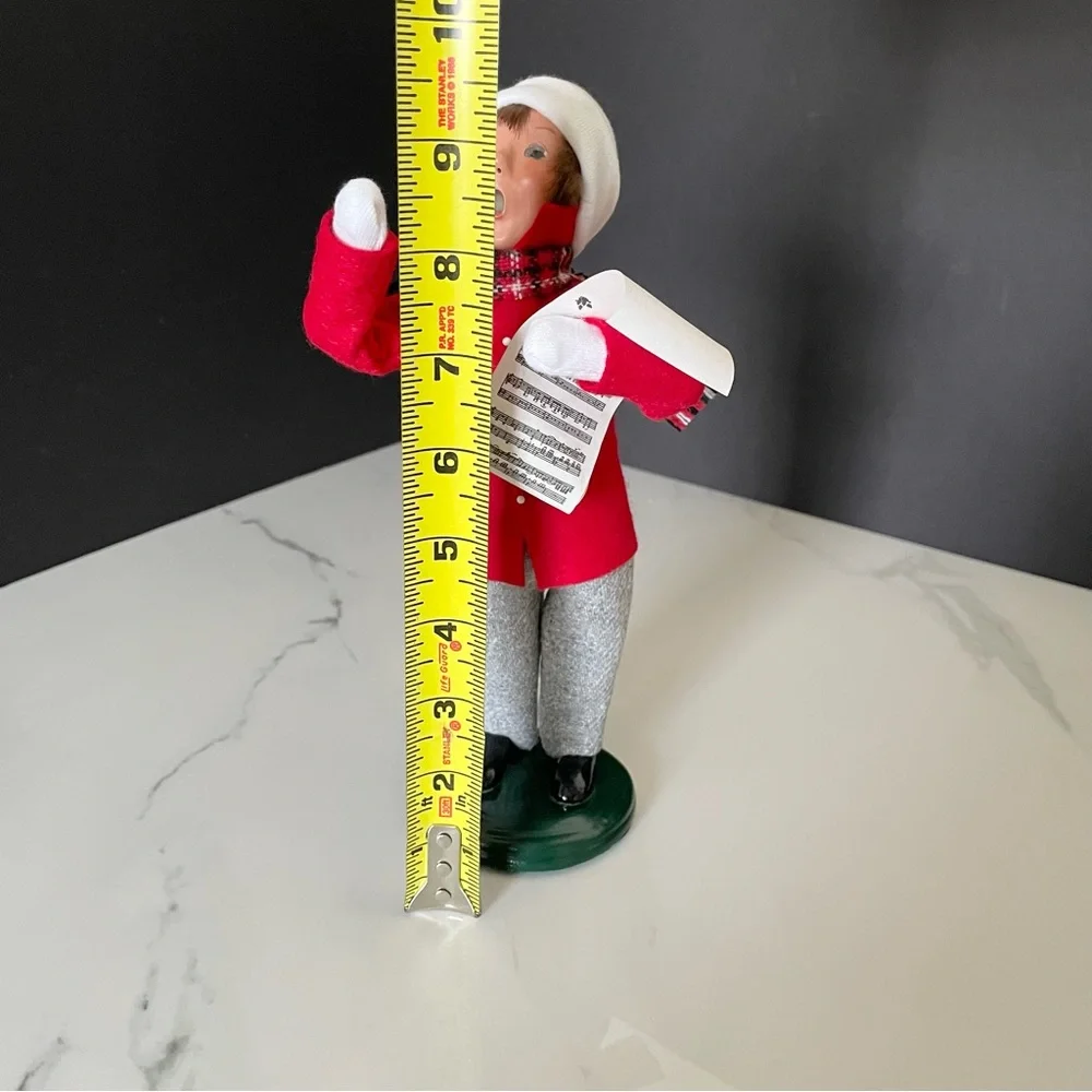 Child Caroler with Sheet Music by Byer's Choice